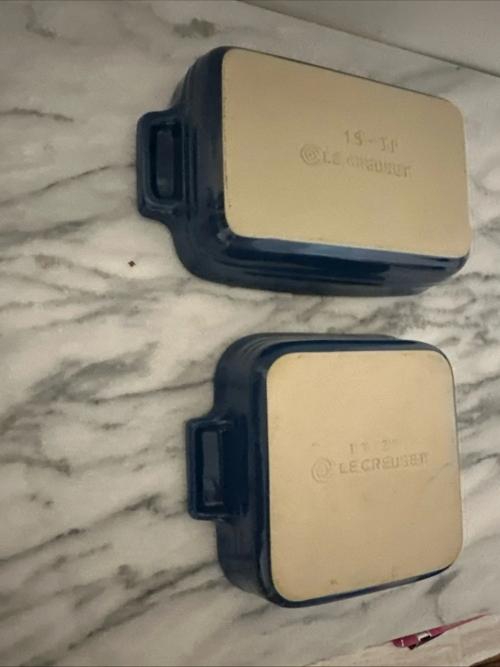 Le Creuset Cream Ceramic Baking Dishes with Blue Rim - Set of 2